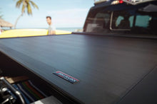 Load image into Gallery viewer, Roll-N-Lock 09-14 Ford F-150 67in E-Series Retractable Tonneau Cover