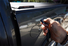 Load image into Gallery viewer, Roll-N-Lock 09-14 Ford F-150 67in E-Series Retractable Tonneau Cover